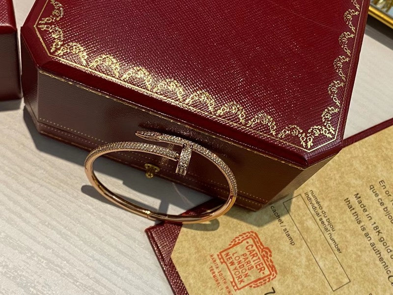 Side view of Cartier unisex jewelry piece