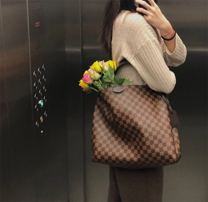  Understated crossbody bag carried on shoulder 22