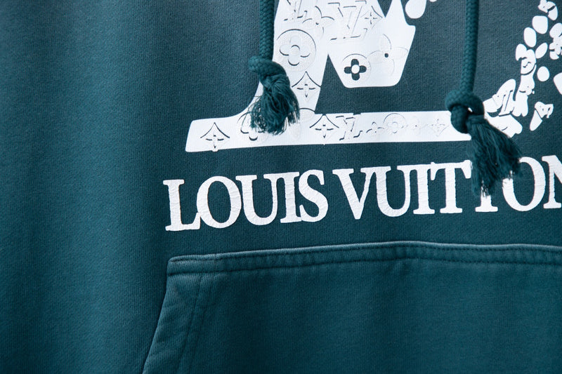 Flat lay presentation of Louis Vuitton luxury clothing with tailored silhouette