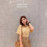 Poised bag shown from front angle