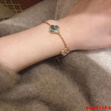 Side view of Van Cleef & Arpels unisex jewelry piece