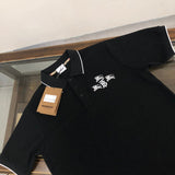 Close-up detail shot of Polo cotton polo shirt with monogram-inspired silhouette