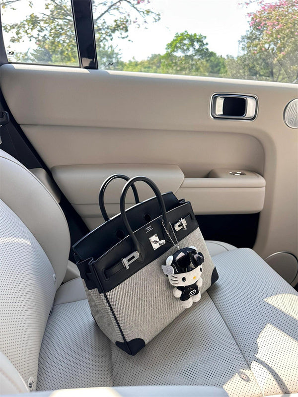 Side view of refined structured handbag