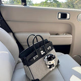 Side view of refined structured handbag