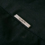 Side profile of Louis Vuitton luxury clothing with monogram-inspired silhouette