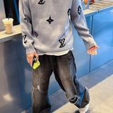 Full styled look of Louis Vuitton luxury clothing with monogram-inspired silhouette