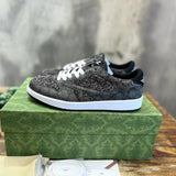 Gucci Designer sneakers in bold contrast breathable knit upper front view