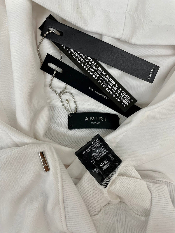 Three-quarter angle view of Amiri luxury piece style No.100