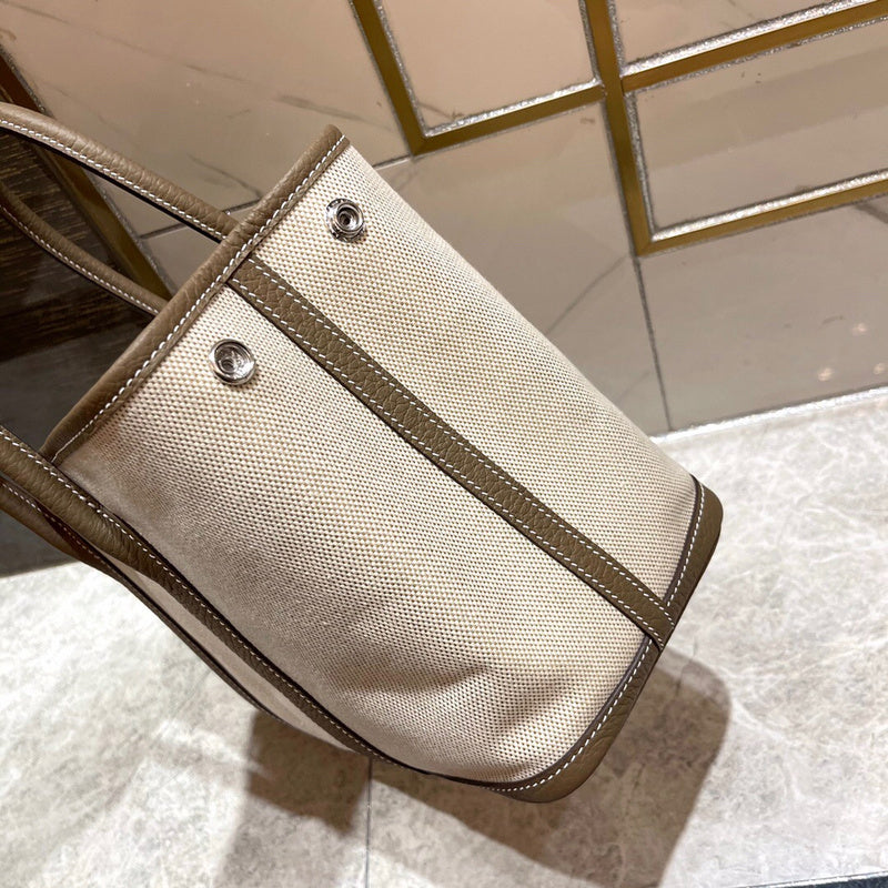 Side view of refined structured handbag