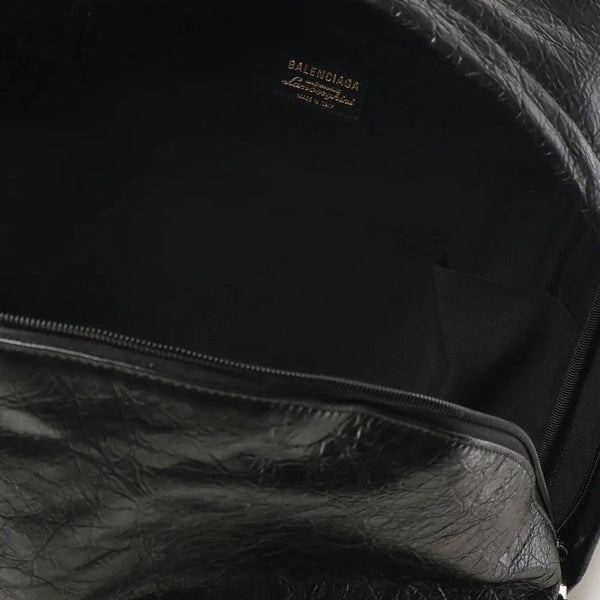 Close-up of Balenciaga backpacks hardware and fine stitching