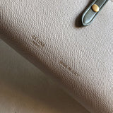 Close-up detail of understated bag design
