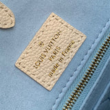  Contemporary top-handle bag carried on shoulder