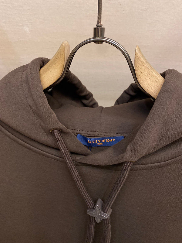 Close-up detail shot of Louis Vuitton luxury clothing with streetwear-inspired cut