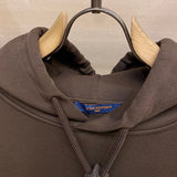 Close-up detail shot of Louis Vuitton luxury clothing with streetwear-inspired cut