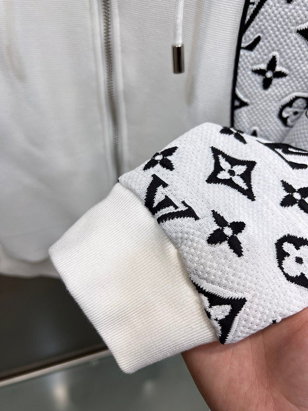 Back view of Louis Vuitton luxury clothing with label-forward styling
