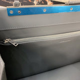 Front view of elevated polished women's handbag – women's statement bag