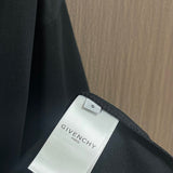 Close-up detail shot of Givenchy luxury clothing with streetwear-inspired cut