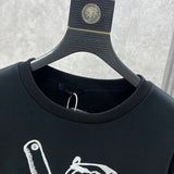 Full styled look of Louis Vuitton luxury clothing with label-forward styling