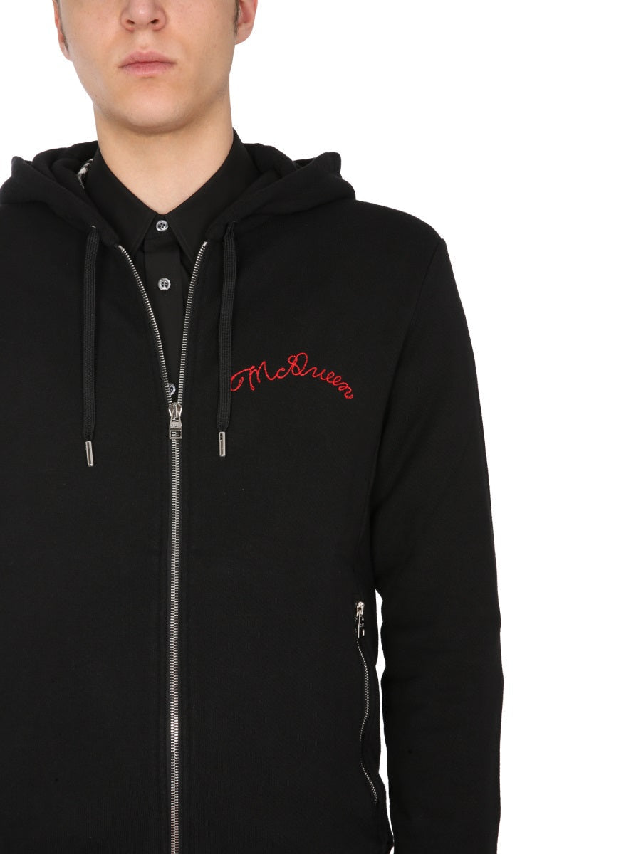 Close-up of Alexander McQueen sweaters & pullovers hardware and fine stitching