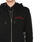 Close-up of Alexander McQueen sweaters & pullovers hardware and fine stitching