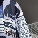 Flat lay presentation of Louis Vuitton cotton t-shirt with signature branding