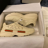 Gucci Fashion sneakers in soft grey bold athletic profile front view