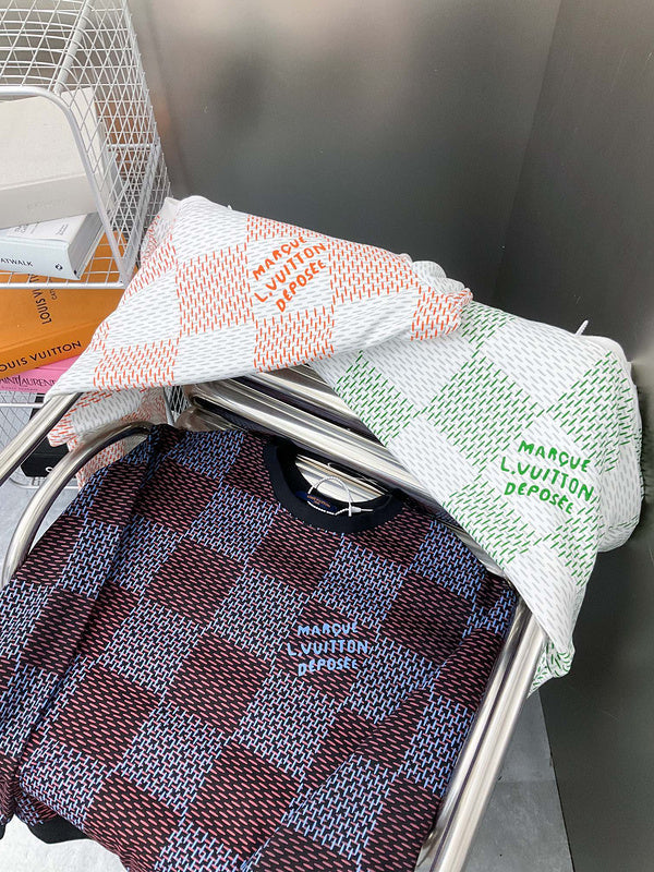 Side profile of Louis Vuitton luxury clothing with label-forward styling
