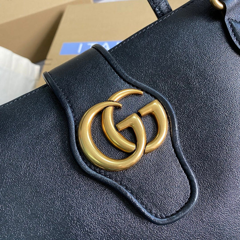 Back view of polished chic women's handbag – women's statement bag