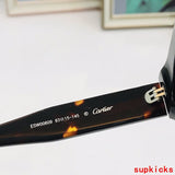 Close-up detail view of Cartier unisex sunglasses
