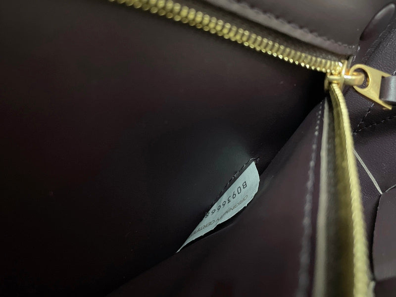 Bold Faux Leather Handbag - Signature Hardware Accents | Women's Statement Accessory #1610 - side angle view (image 2) of designer-inspired handbag