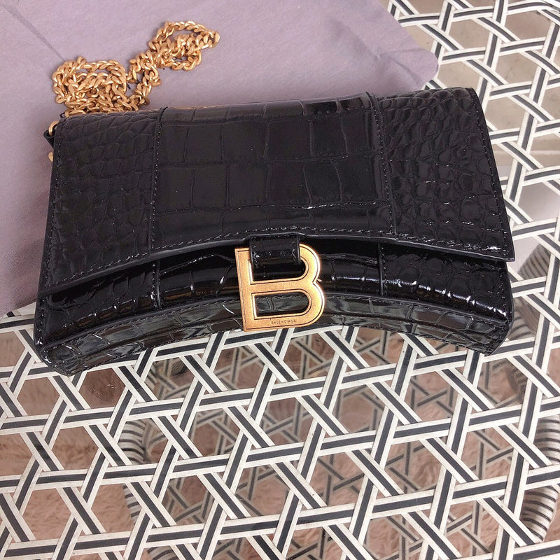 Back view of sleek polished women's handbag – women's luxury handbag
