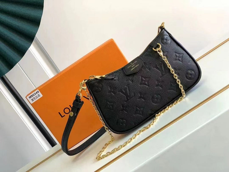 Side profile of everyday-luxe refined women's handbag – women's luxury accessory