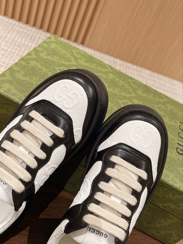 Side profile of Gucci soft grey sneakers chunky sole construction