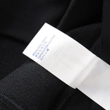 Close-up detail shot of Louis Vuitton luxury clothing with tailored silhouette