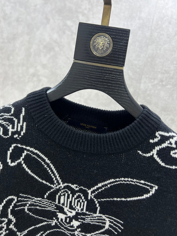 Close-up detail shot of Louis Vuitton luxury clothing with label-forward styling
