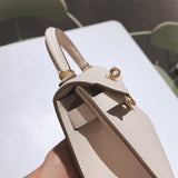 Close-up detail of understated bag design