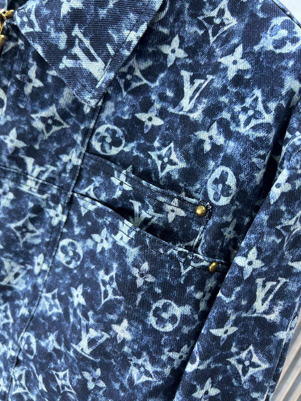 Flat lay presentation of Louis Vuitton luxury clothing with runway-inspired design
