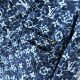 Flat lay presentation of Louis Vuitton luxury clothing with runway-inspired design