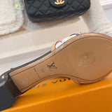 Louis Vuitton Beige Bow-Detail Flats - Close-Up Texture View
