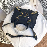 Handle and strap detail of elevated refined women's handbag – women's premium purse