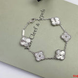 Lifestyle view of Van Cleef & Arpels unisex jewelry piece