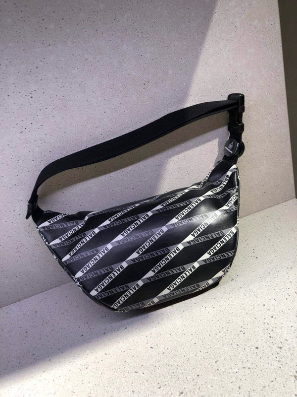 Side profile of classic sleek women's handbag – women's luxury accessory