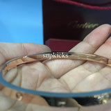 Angled view of Cartier unisex jewelry piece