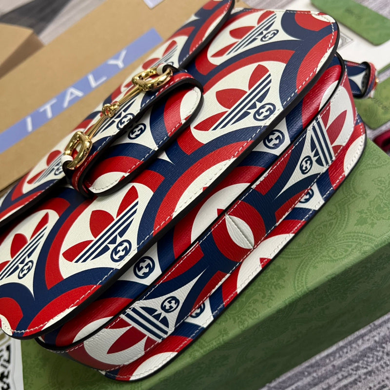 Styled lifestyle shot of modern signature women's handbag – women's luxury handbag