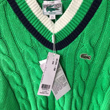 Close-up detail shot of Lacoste luxury clothing with monogram-inspired silhouette