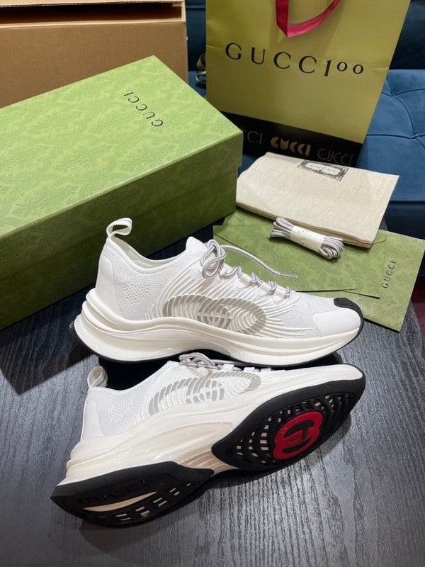 Side profile of Gucci fresh white-and-black sneakers minimalist modern build