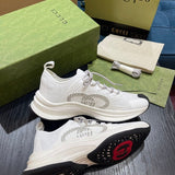 Side profile of Gucci fresh white-and-black sneakers minimalist modern build
