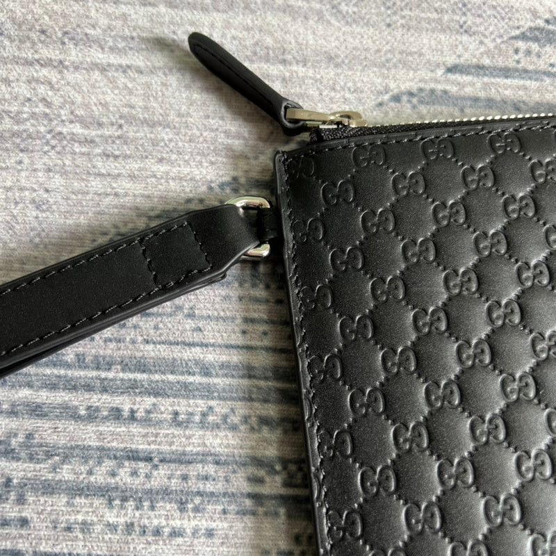 Side view of polished structured handbag