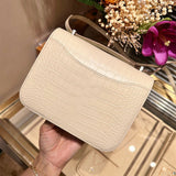 Side view of timeless structured handbag