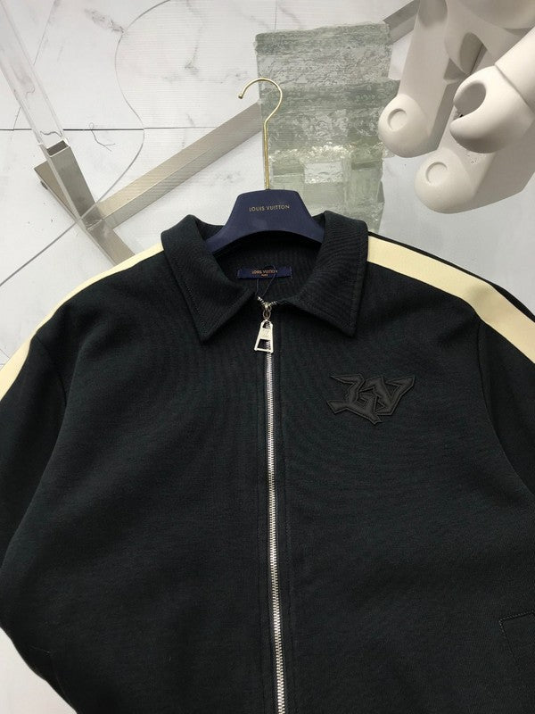 Front view of Louis Vuitton luxury clothing with tailored silhouette